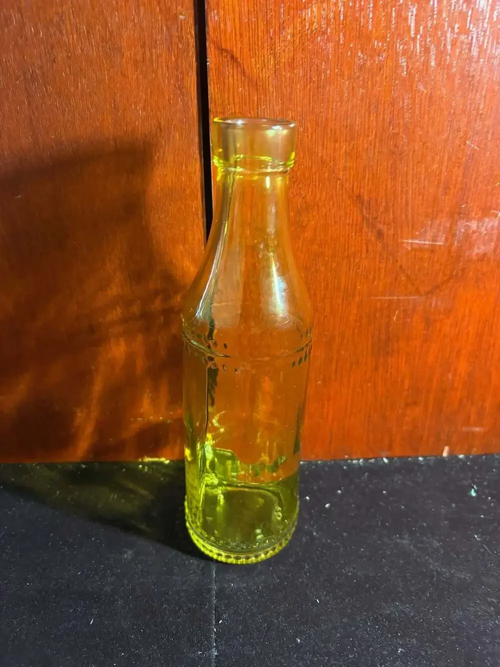 Vintage Yellow Green Glass Bottle with Beaded Embossed Accent
